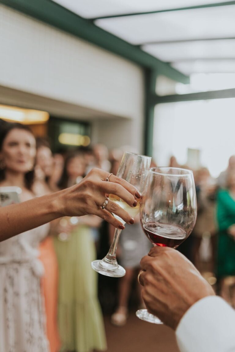 celebratory wine toast at indoor event